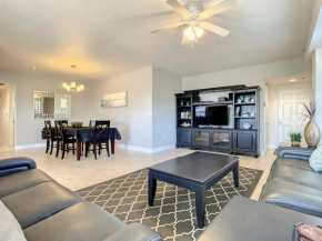 Upscale 32 corner unit with private balcony overlooking the property. OW14-401